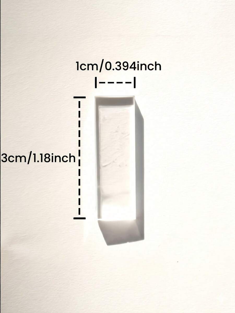 Single clear rectangular fire starter stick on white background. Dimensions: 1cm/0.394inch width, 3cm/1.18inch length