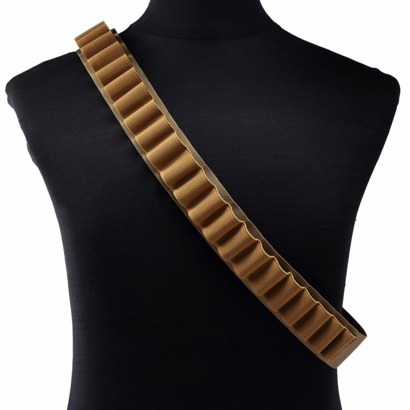 Tan khaki shotgun shell bandolier with 25 elastic loops, displayed diagonally across a black mannequin